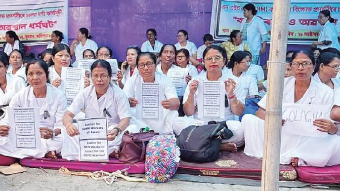 NHM workers in Assam continue protest in Guwahati, demand equal pay and job security